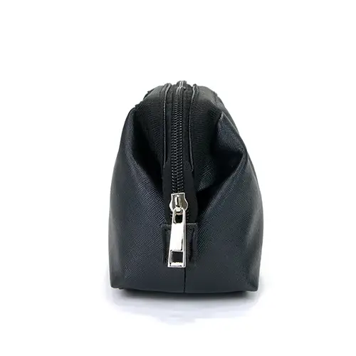 Premium black vegan leather texture makeup pouch with quiet luxury matte finish